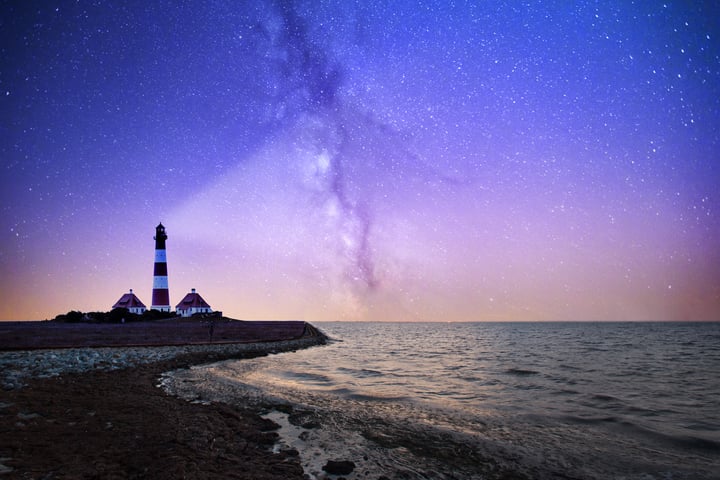 Coastal scene with a lighthouse